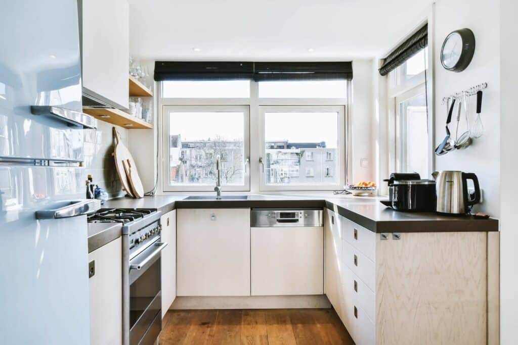 Small kitchen with white color scheme