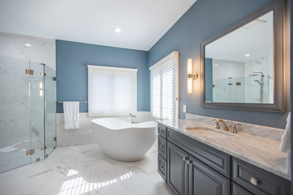 Blue bathroom walls with modern fixtures and finishes