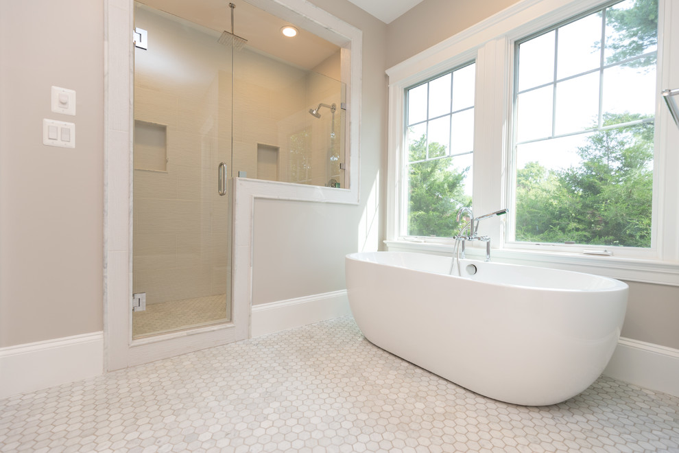 Modern walk-in shower with a half wall