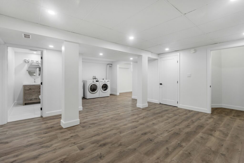 Basement finishing project in Northern Virginia with open framing and planned living space