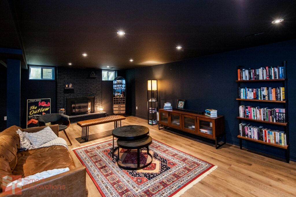 Modern finished basement with comfortable seating, entertainment area, and warm wood flooring