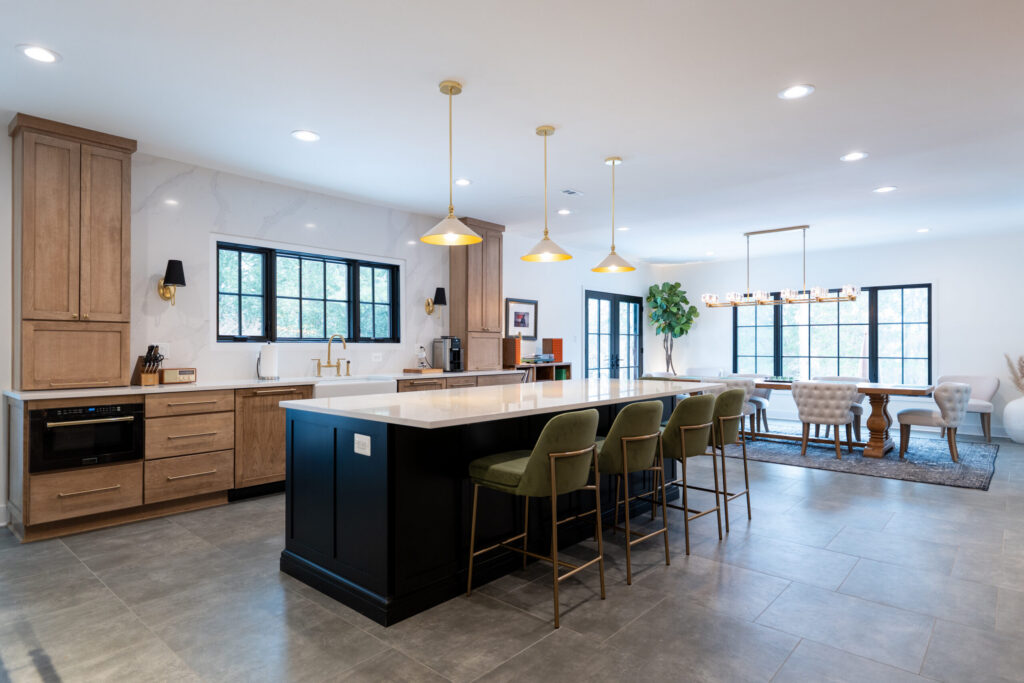 Natural white oak kitchen cabinetry with a large island and warm wood finishes
